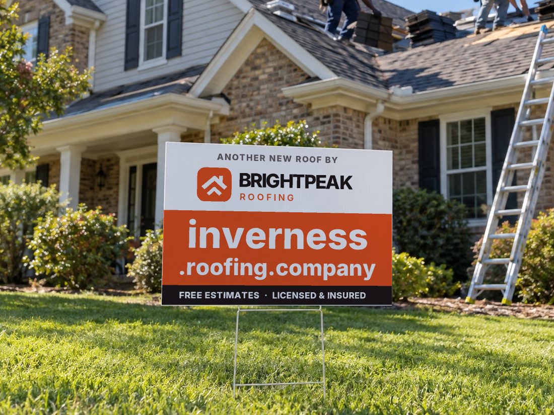 inverness.roofing.company on a yard sign in front of a house getting a new roof